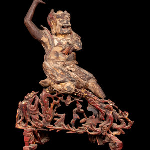 Appraisal: A Chinese Wood Carving of Demon Gui Height overall in