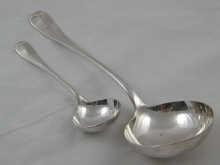 Appraisal: A silver soup ladle and sauce ladle both rattail pattern