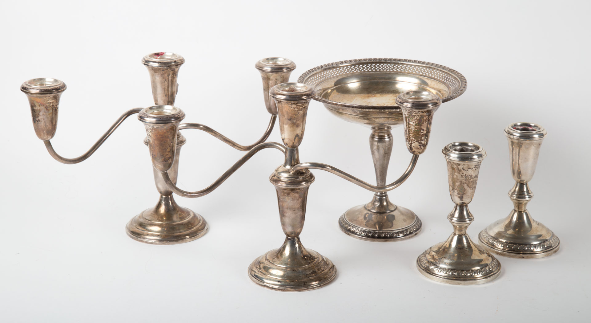 Appraisal: Five weighted sterling silver table items including pair of low