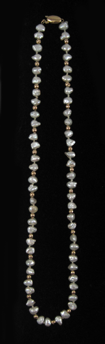 Appraisal: BAROQUE PEARL AND FOURTEEN KARAT GOLD NECKLACE measuring - inches