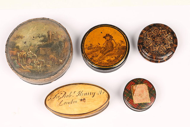 Appraisal: A PAPIER MACH CIRCULAR SNUFF BOX with a painted scene