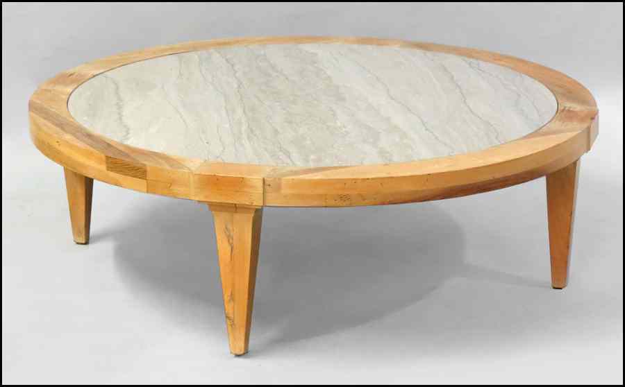 Appraisal: ROUND BLONDE WOOD COCKTAIL TABLE With an inset marble top