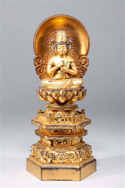 Appraisal: Elaborate antique Japanese carved wood Buddha with allover gilt calligraphy