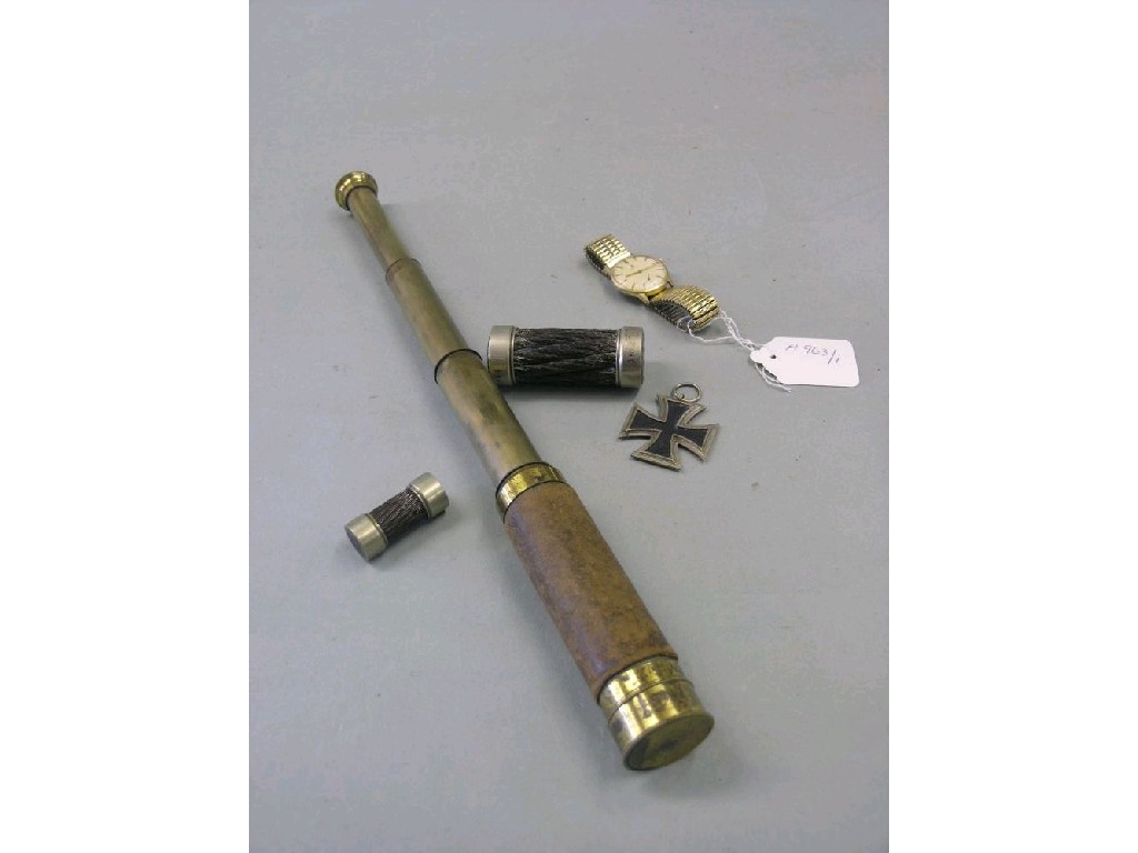 Appraisal: A lacquered brass telescope opening in three sections two telegraph