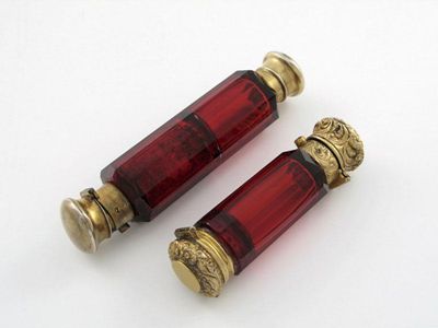 Appraisal: A th century silver-gilt mounted ruby glass scent bottle vinaigrette