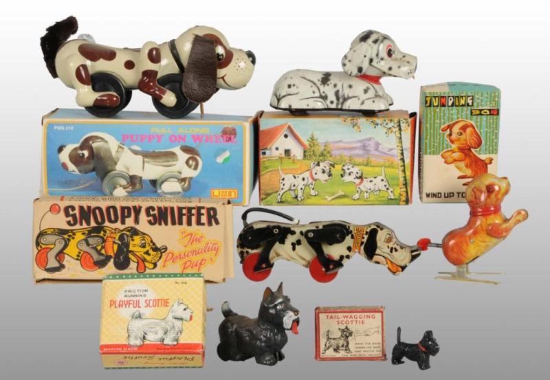 Appraisal: Lot of Dog Toys Description Includes tin friction Spanish Dalmatians