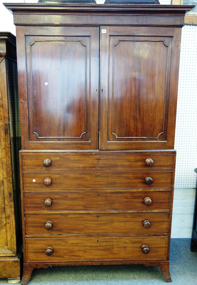 Appraisal: A George III mahogany secretaire linen press the pair of