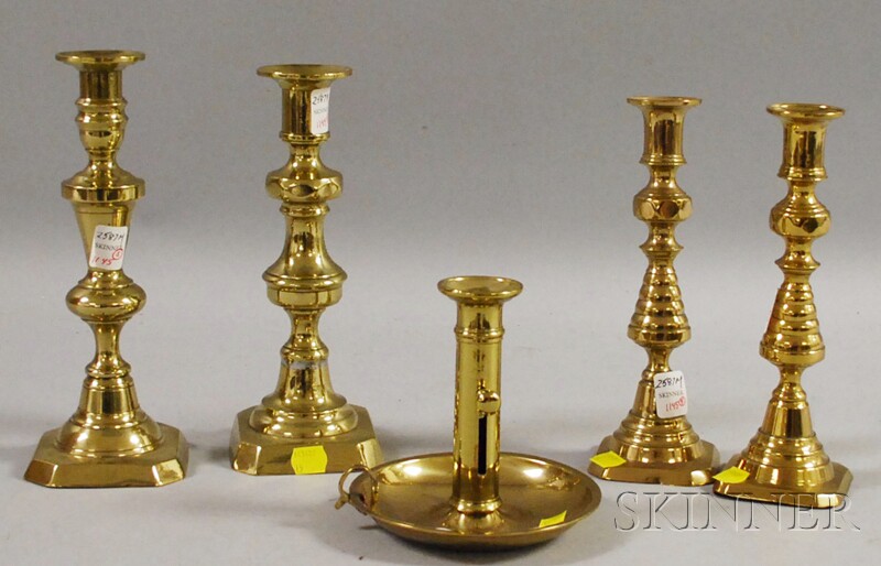 Appraisal: Four Brass Candlesticks and a Chamberstick four square base candlesticks