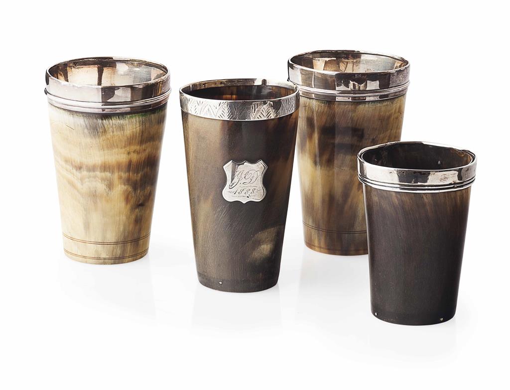 Appraisal: FOUR HORN BEAKERS each of tapering form with simple reeded