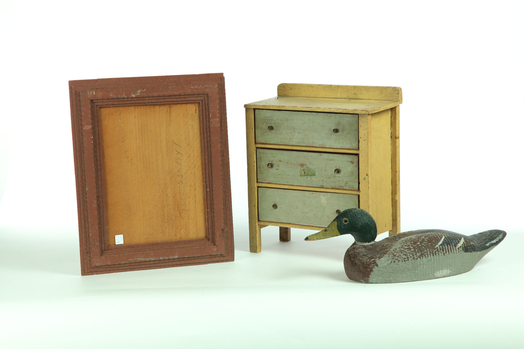 Appraisal: FRAME DECOY AND DOLL DRESSER American th century Mallard drake