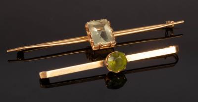 Appraisal: Two gem set bar brooches each set in unhallmarked yellow