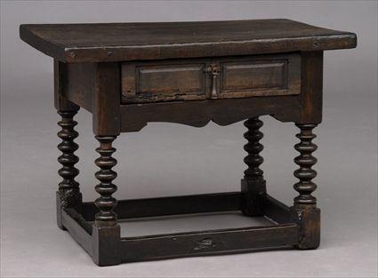 Appraisal: ITALIAN BAROQUE SINGLE-DRAWER SIDE TABLE The rectangular top on turned