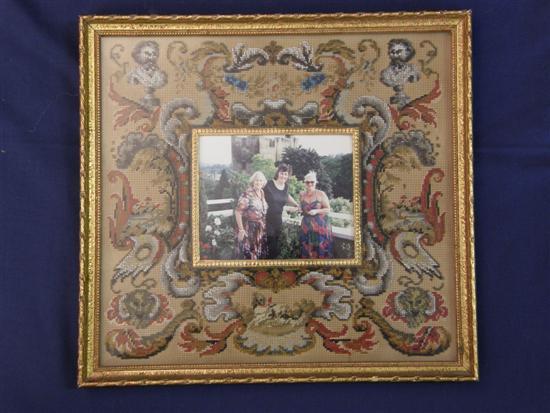 Appraisal: Small beadwork mounted picture frame with mask and scrolling foliage