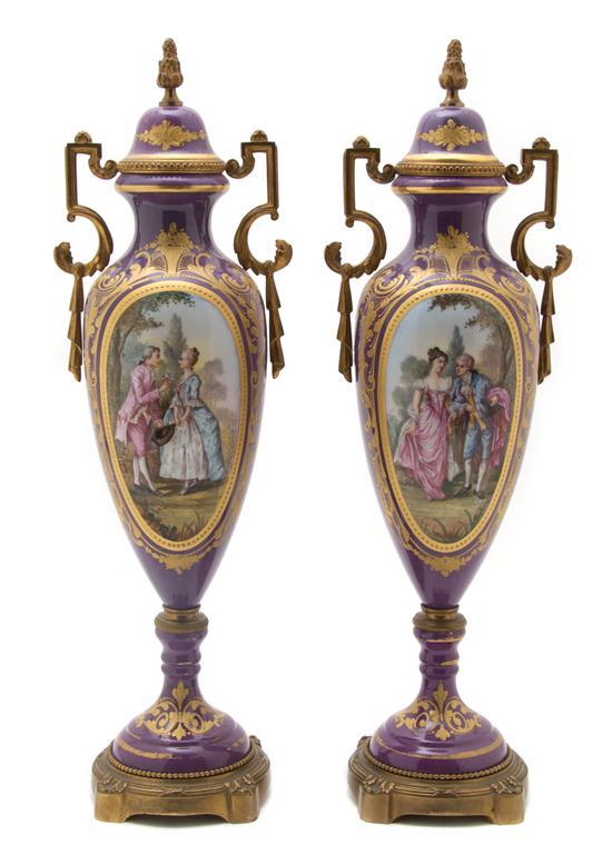 Appraisal: A Pair of Sevres Style Gilt Bronze Mounted Vases depicting