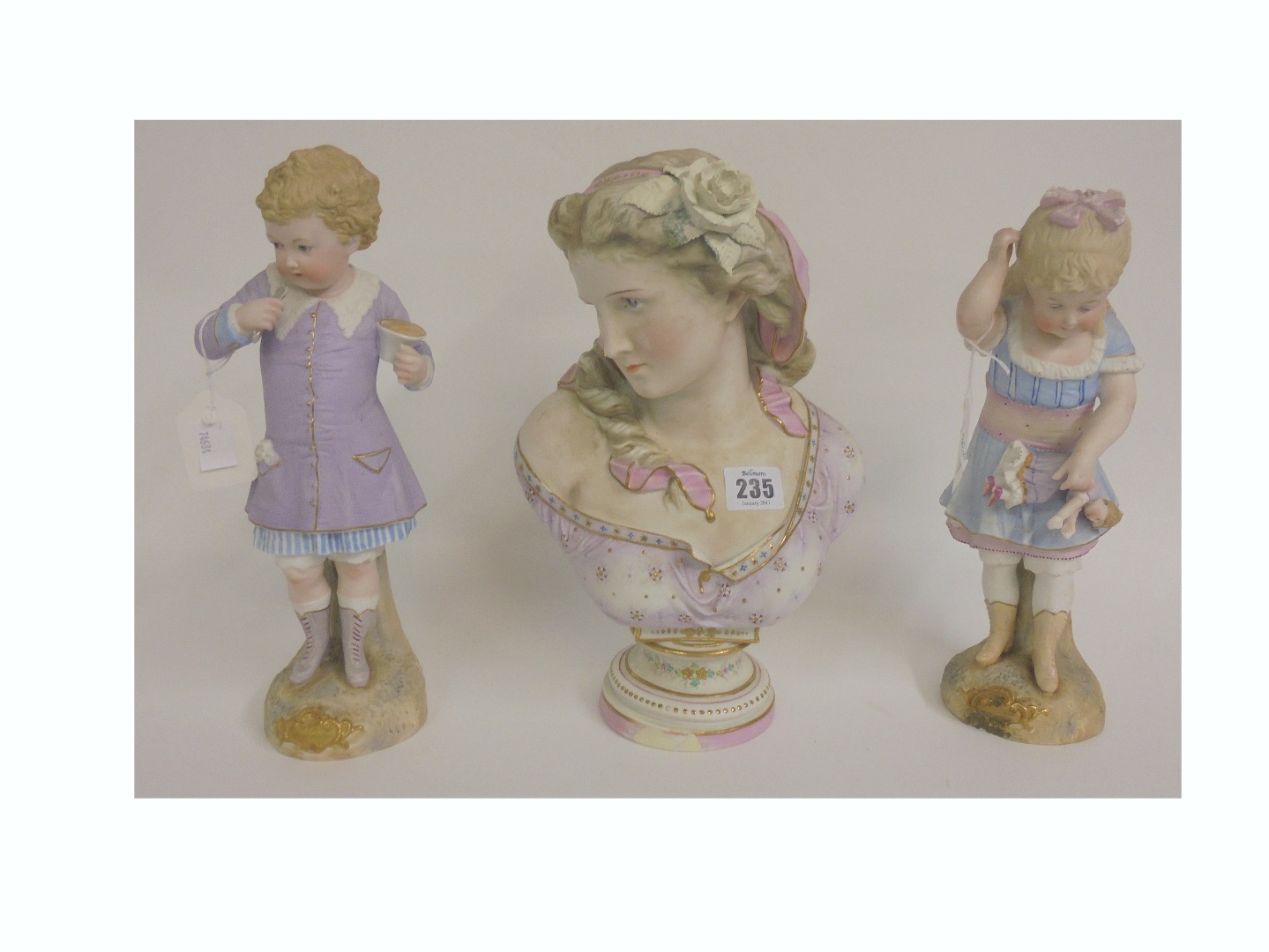 Appraisal: A Continental coloured bisque bust of a young beauty on