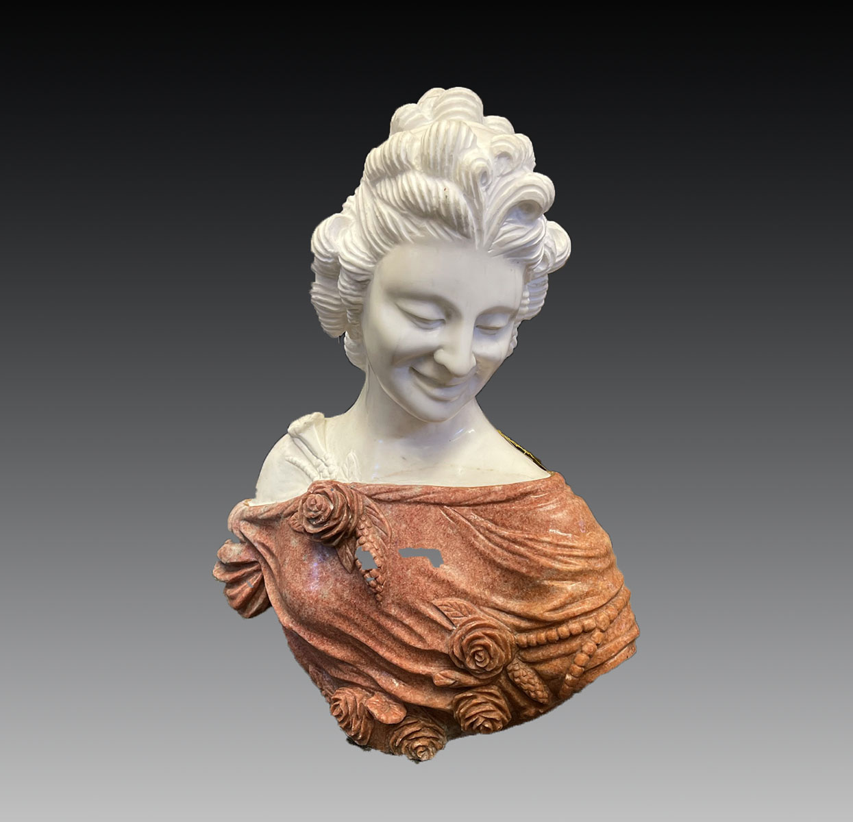 Appraisal: CARVED MARBLE BUST OF A FEMALE Pink and White marble