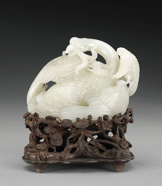 Appraisal: A white jade carving of two birds Depicting a goose