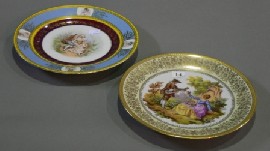 Appraisal: A Limoges specimen plate painted with courting lovers together with