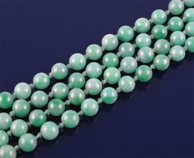 Appraisal: A jade bead necklace The long necklace comprises ninety five