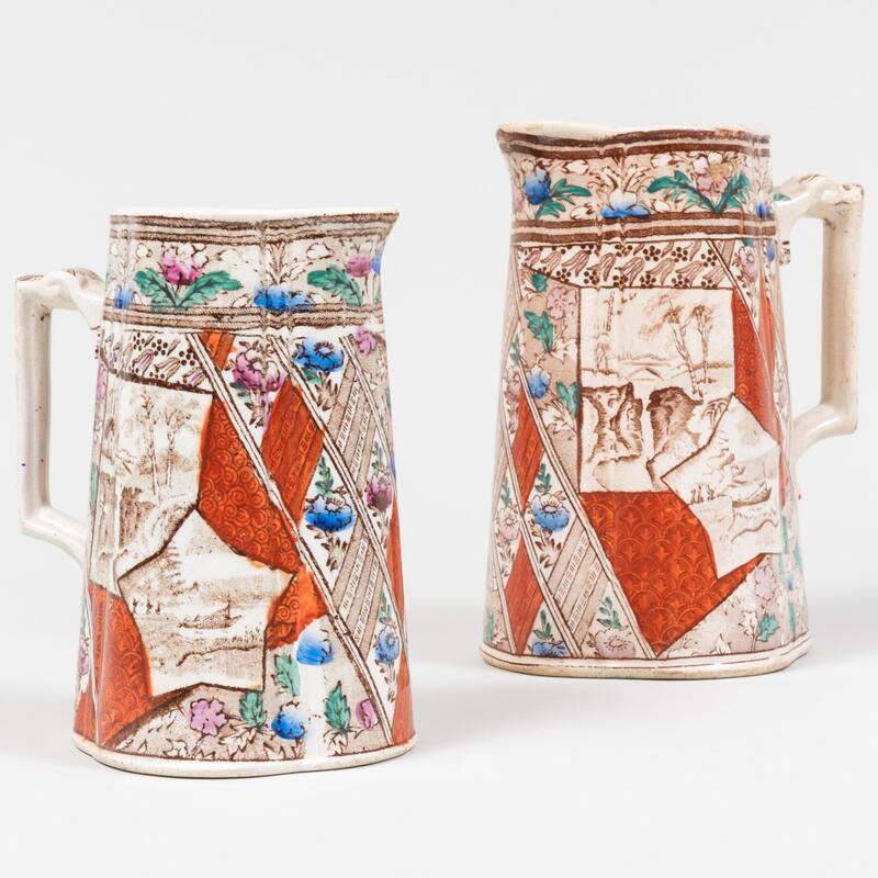 Appraisal: Pair of English Transfer Printed and Enriched Pitchers Brown printed