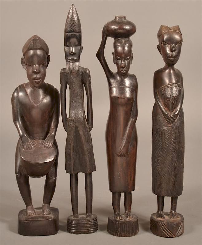 Appraisal: Vintage African Carved Ebony Wood Figures Four Vintage African Carved