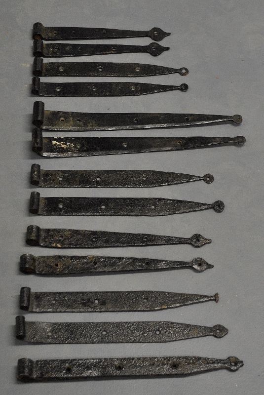 Appraisal: - Thirteen wrought iron strap hinges th th c Longest