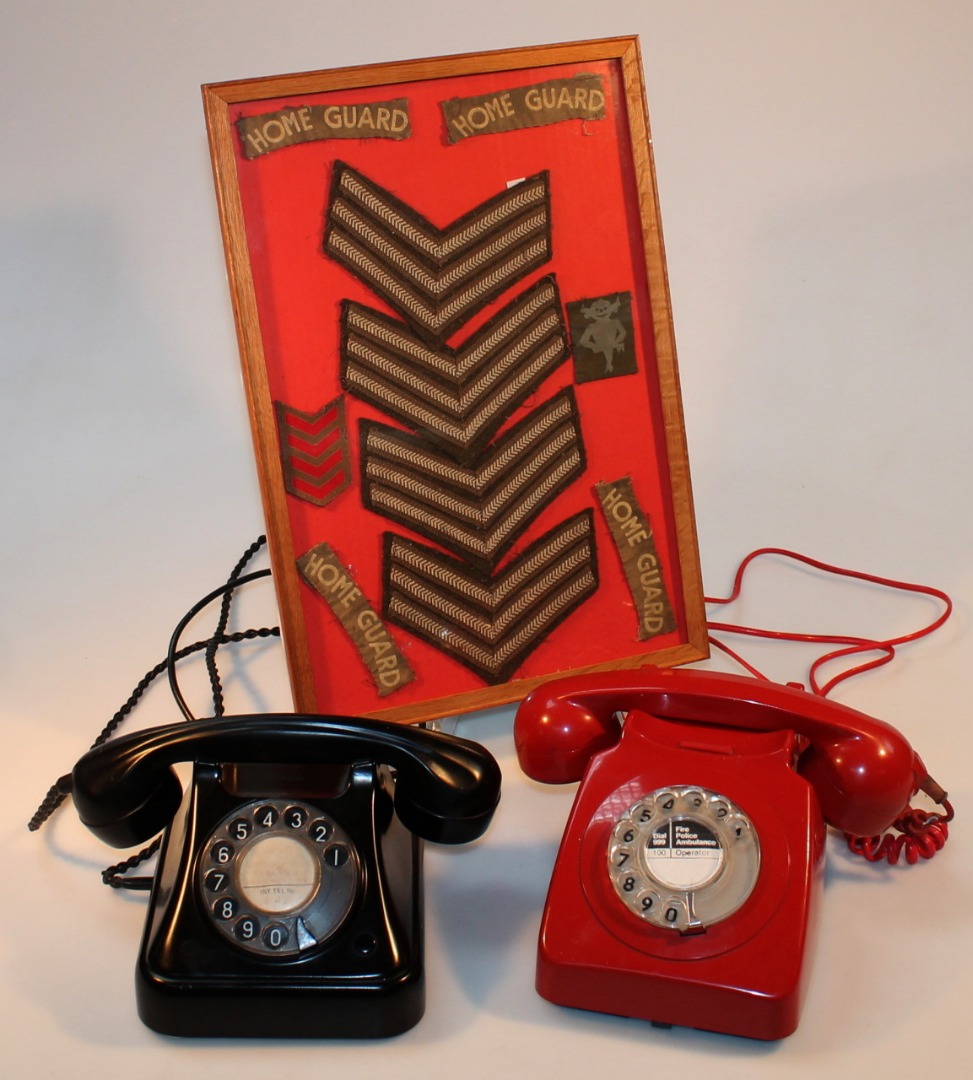 Appraisal: A thC telephone with hand receiver in red with front