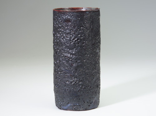 Appraisal: BEATRICE WOOD Cylindrical vase its interior covered in lustered oxblood