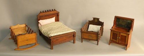 Appraisal: Three doll beds together with a dresser