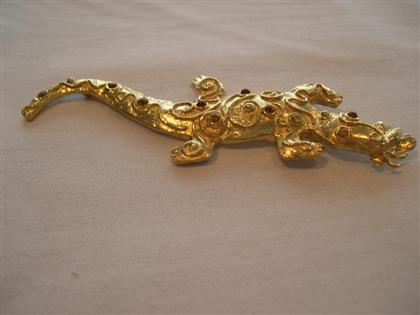 Appraisal: karat yellow gold Chameleon brooch Yellow gold chameleon brooch accented