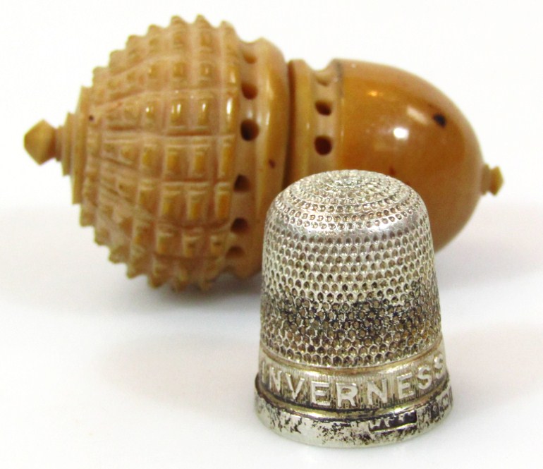 Appraisal: A polished nut shaped thimble case probably early thC with