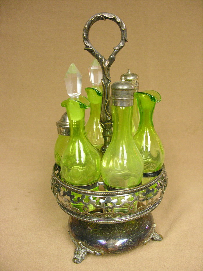 Appraisal: GREEN INVERTED THUMBPRINT CONDIMENT SET Marked Christofle and numbered Condition