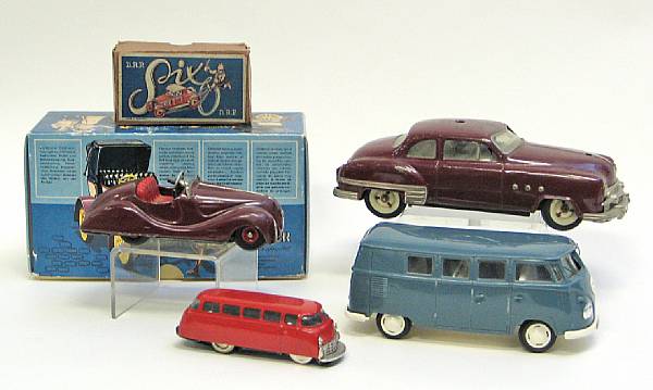 Appraisal: German toy vehicles Lot includes various scaled tin toys including