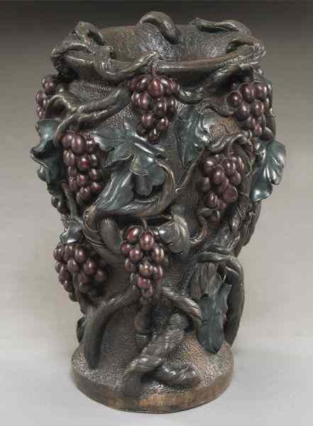 Appraisal: Auguste Moreau bronze polychrome urndecorated with grapevines Inscribed on base