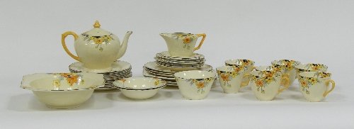 Appraisal: A Crown Ducal part tea service Sunburst pattern approximately thirty-six