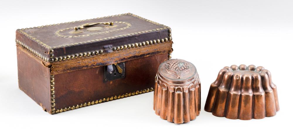 Appraisal: LEATHER-COVERED DOCUMENT BOX AND TWO COPPER COOKING MOLDS TH CENTURY