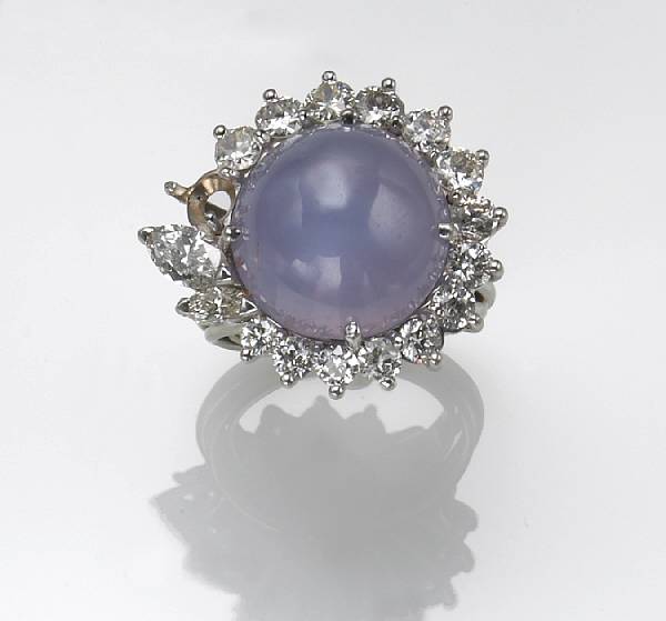 Appraisal: A star sapphire diamond and k white gold ring estimated