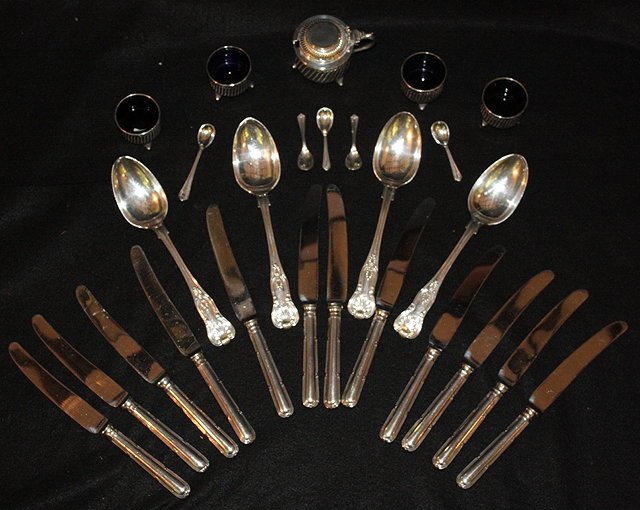 Appraisal: A SET OF FOUR SHELL PATTERN SILVER PLATED TABLE SPOONS