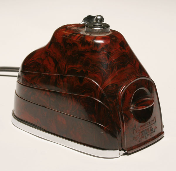 Appraisal: Art Deco streamline 'Morrisharp' chrome and bakelite electric pencil sharpener