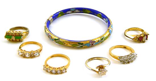 Appraisal: JEWELRY Costume jewelry six rings and one enamel bracelet ring