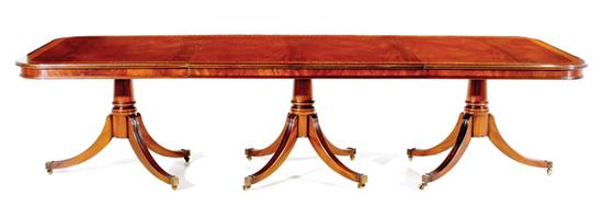 Appraisal: Regency style triple-pedestal mahogany banquet table rectangular three-piece top with