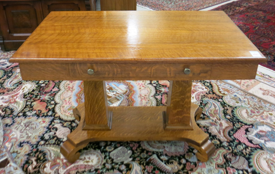 Appraisal: AN OAK LIBRARY TABLE Empire Revival style American c having