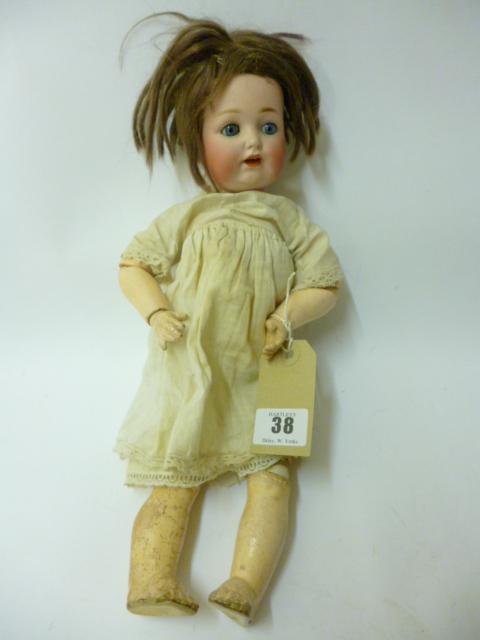 Appraisal: A J D Kestner bisque head character doll sleeping blue