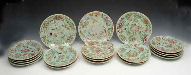 Appraisal: A COLLECTION OF EIGHTEEN CANTONESE CELADON GROUND PLATES with famille