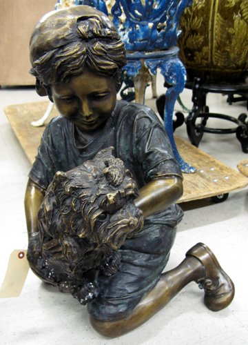 Appraisal: FIGURAL BRONZE SCULPTURE kneeling boy with dog verde and golden