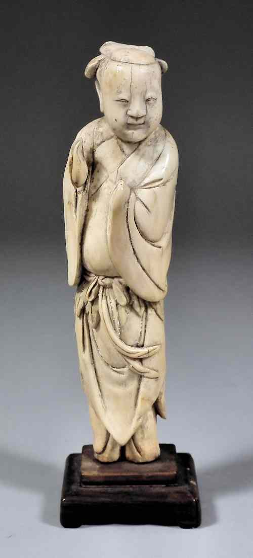 Appraisal: A Chinese carved ivory figure of a Maiden ins mm