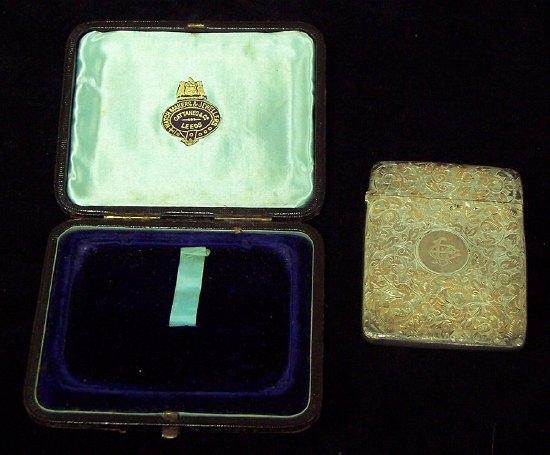 Appraisal: A visiting card case of rounded rectangular outline with chased