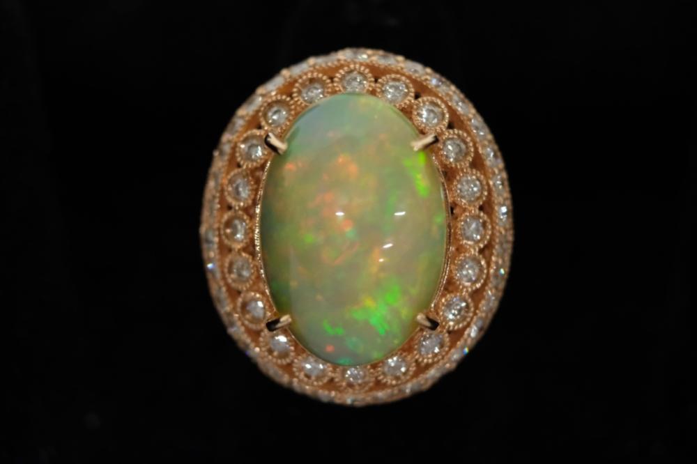 Appraisal: CT HARLEQUIN FIRE OPAL RING SZ Carat cabochon cut harlequin