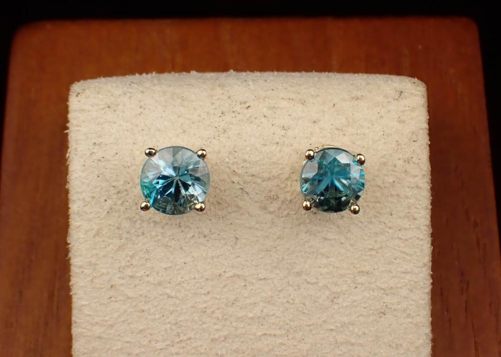 Appraisal: PAIR OF BLUE ZIRCON AND FOURTEEN KARAT GOLD EAR STUDS