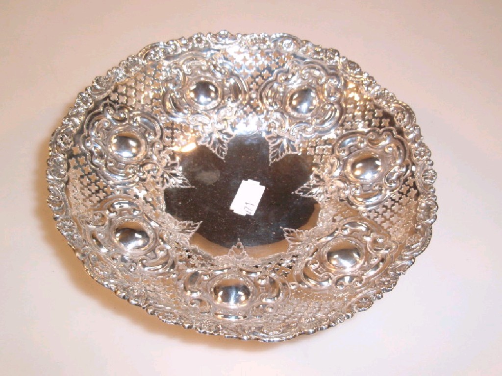 Appraisal: A late Victorian silver bon-bon dish by Walker Hall repouss